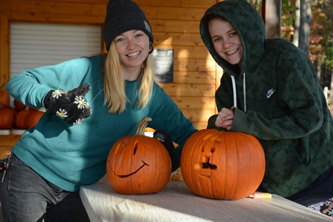 People at Pumpkin Carving with their Pumpkins