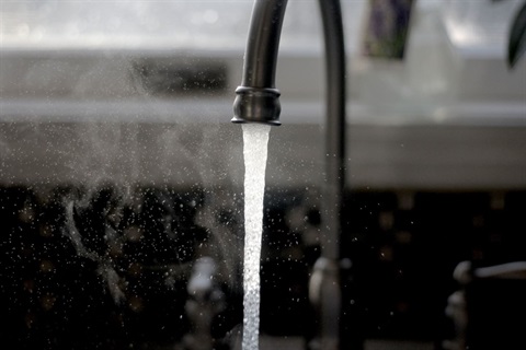 Running water through sink